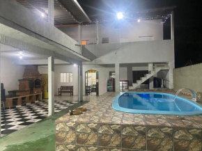 Ótima casa com piscina em Praia Grande